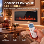 Hand holding the remote control with schedule and timer icons in front of the fire