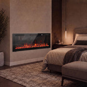 Electric fire on a bedroom wall beside a bed in warm lighting