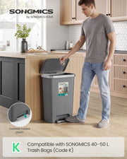 Man dropping rubbish into a grey 50L kitchen bin, with a close-up of the folded-down foot pedal