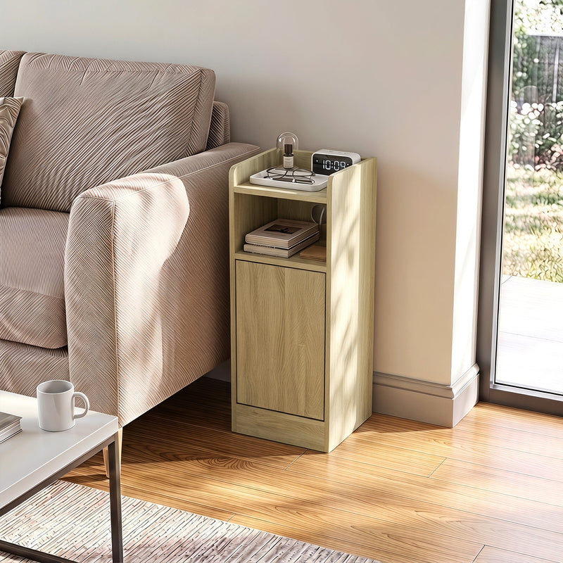 Oak slim table beside a sofa with a clock and glasses on the top tray