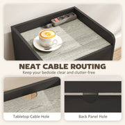 Close-up of the cable holes in the tabletop and back panel for neat cable routing
