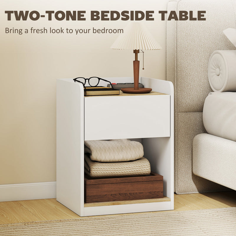 Two-tone white and oak bedside table next to a bed in a bedroom setting