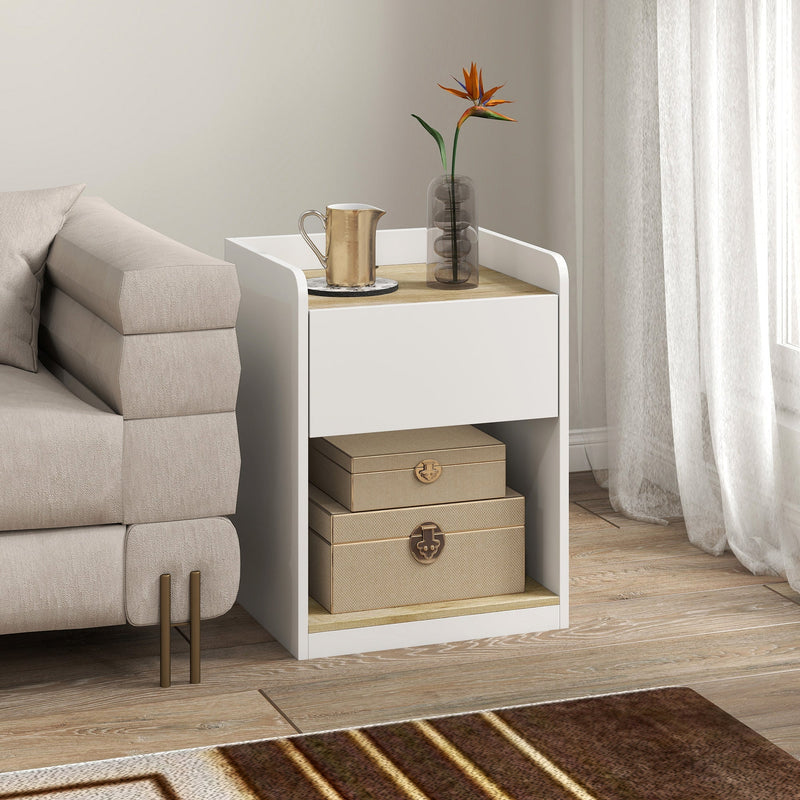 White and oak bedside table used as a side table next to a sofa with storage boxes on the shelf