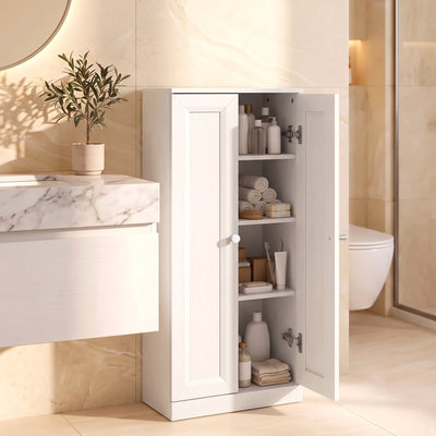 White bathroom cabinet in a bathroom setting beside a vanity unit, one door open showing toiletries