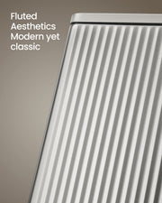 Close-up of the vertical fluted ribbing on the brushed stainless steel body of the Songmics 50 L pedal bin