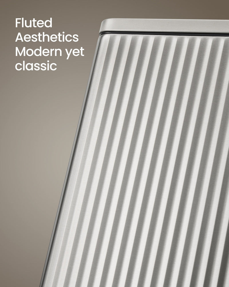 Close-up of the vertical fluted ribbing on the brushed stainless steel body of the Songmics 50 L pedal bin