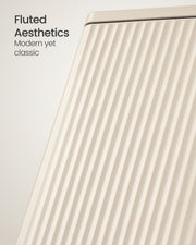 Close-up of the vertical fluted ribbing on the beige steel body of the Songmics 50 L pedal bin