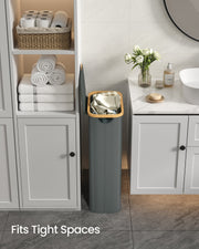 Fits Tight Spaces panel showing the hamper tucked between a storage cabinet and a bathroom vanity