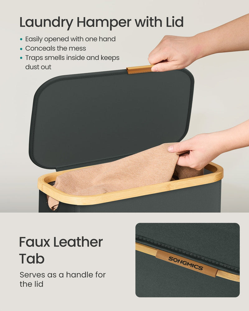 A hand lifting the grey lid away by its bamboo trimmed edge