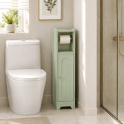 Light green bathroom cabinet with a toilet roll beside a toilet and shower screen