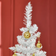 Close-up of the white tree top decorated with gold baubles