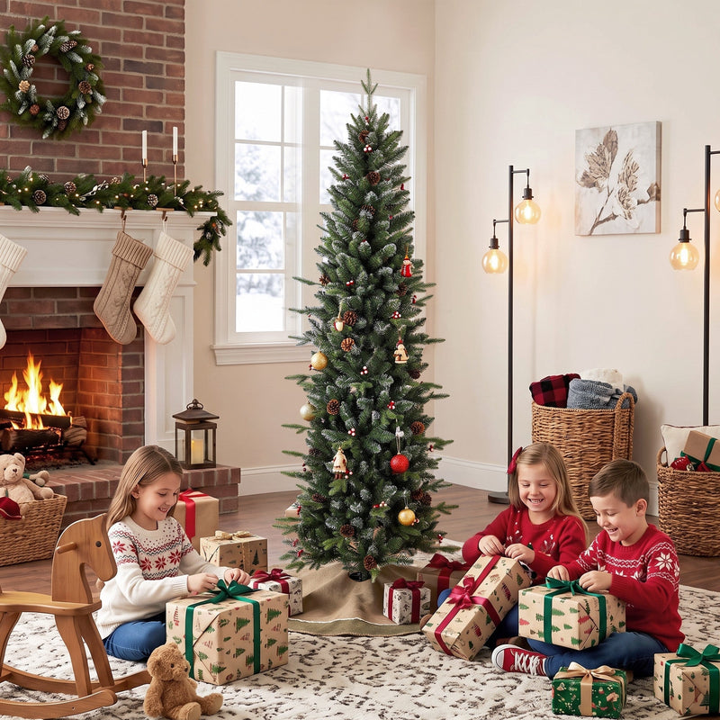 Children opening presents beside the decorated slim Christmas tree by a brick fireplace