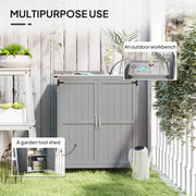 Multipurpose use panel showing the grey shed working as an outdoor workbench on a patio