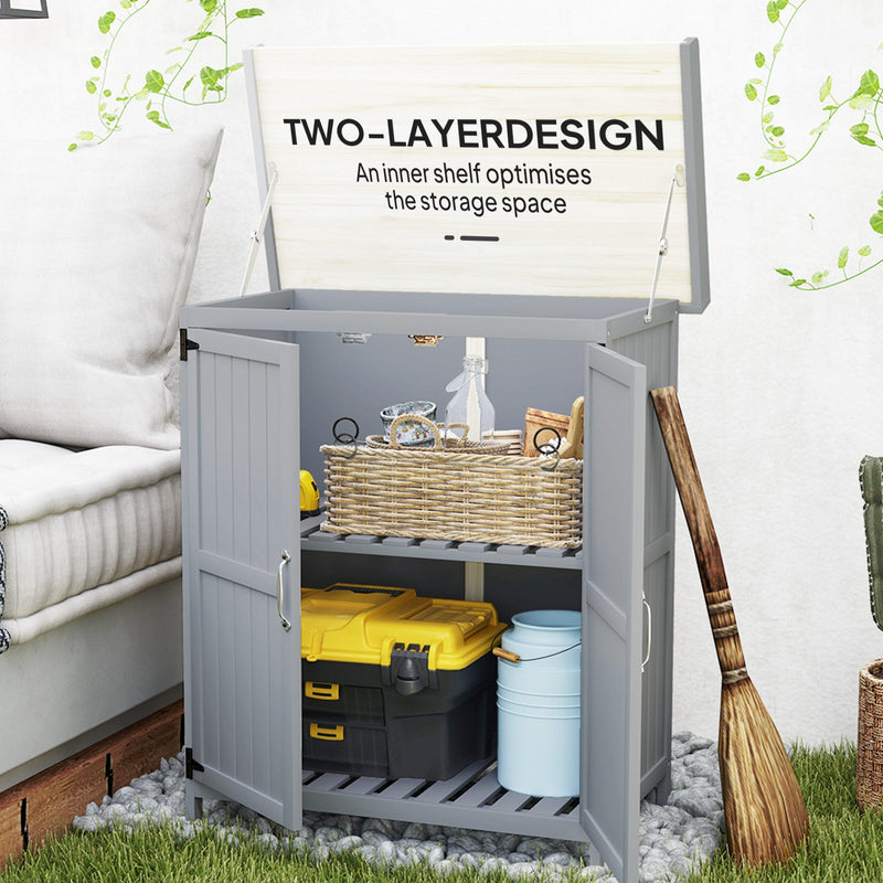 Two layer interior with a slatted inner shelf holding a wicker basket above a yellow toolbox and bucket
