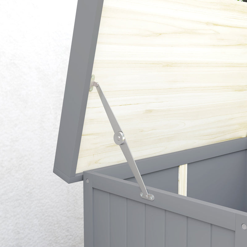 Close-up of the metal support stay holding the hinged lid of the grey wooden shed open