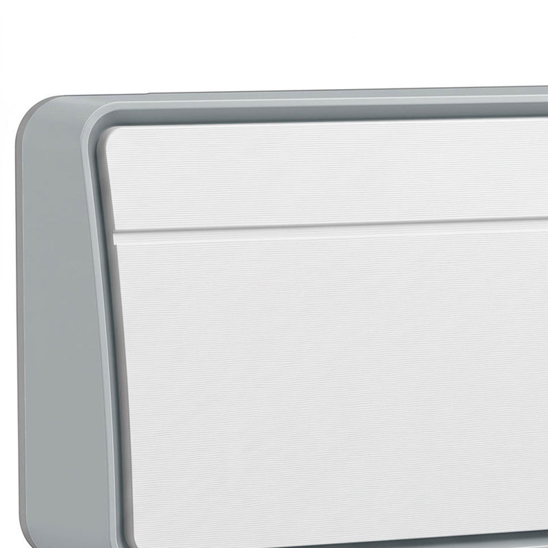 Close-up of the white heater's front panel and grey trim