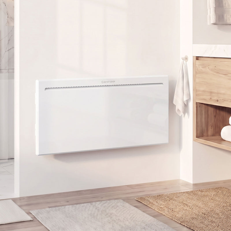 White panel heater styled in a modern living room