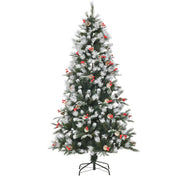6ft snow dipped artificial Christmas tree with red berries and pinecones on a black metal base