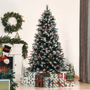 6ft snow dipped Christmas tree in a living room with a wreath, fireplace and gifts