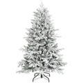 5ft snow flocked Christmas tree on a white background with a black metal base