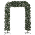 Snow frosted Christmas tree arch, 180 cm wide, on a white background with two metal bases
