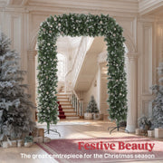 Frosted Christmas arch framing a hallway and staircase