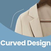 Close-up of curved hanger shoulder supporting a blazer without shoulder dents