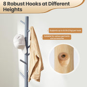 The grey coat rack holding a cap and a tan jacket, captioned 8 robust hooks at different heights taking 3 kg each