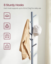 Coat rack packaging and included parts laid out before assembly
