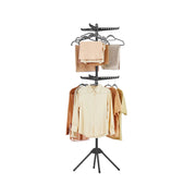 Songmics black rotary clothes airer studio shot with clothes on hangers
