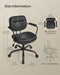 Image of a Songmics black leather office chair with wheels and arms