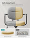 Image of a Songmics grey leather office chair with wheels and arms