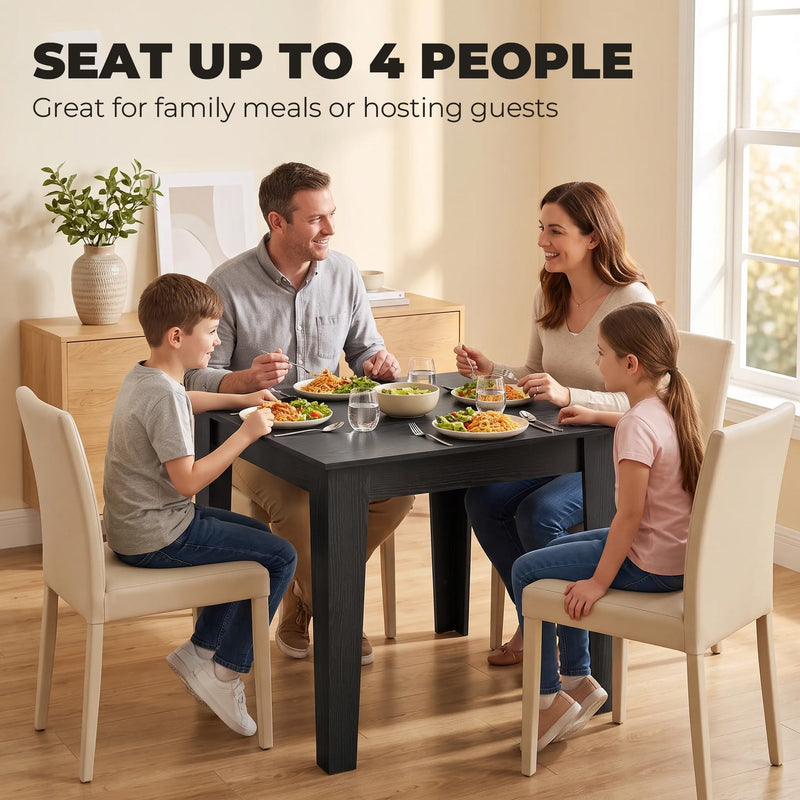 Family of four eating a meal at the Black Wood Effect dining table