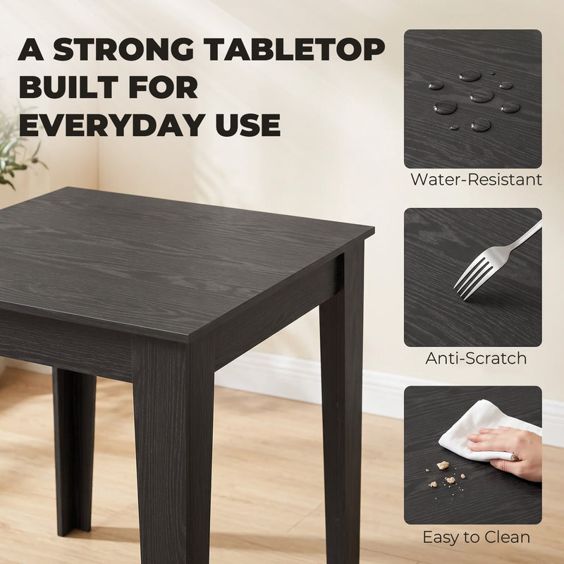 Close-up of the Black Wood Effect tabletop showing water-resistant, anti-scratch and easy-clean finish