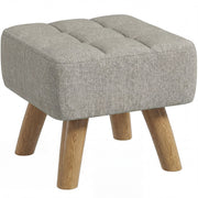 Light brown linen-look footstool with tufted top and oak-tone wooden legs