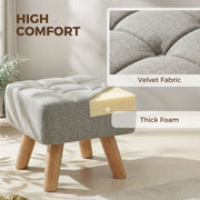 Close-up of the tufted fabric top and foam padding layer inside the footstool