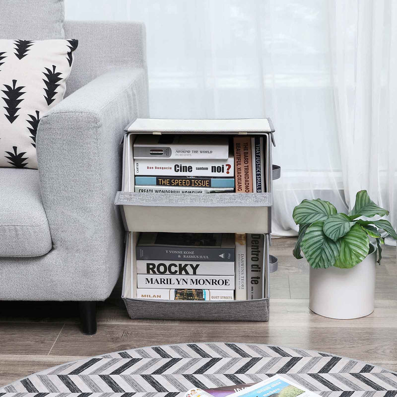 Grey storage boxes beside a sofa holding books and records in a living room