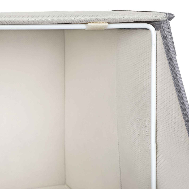 Close-up inside a box showing the cream lining and the white metal frame rod