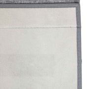 Close-up of the woven grey fabric outer and the pale inner lining