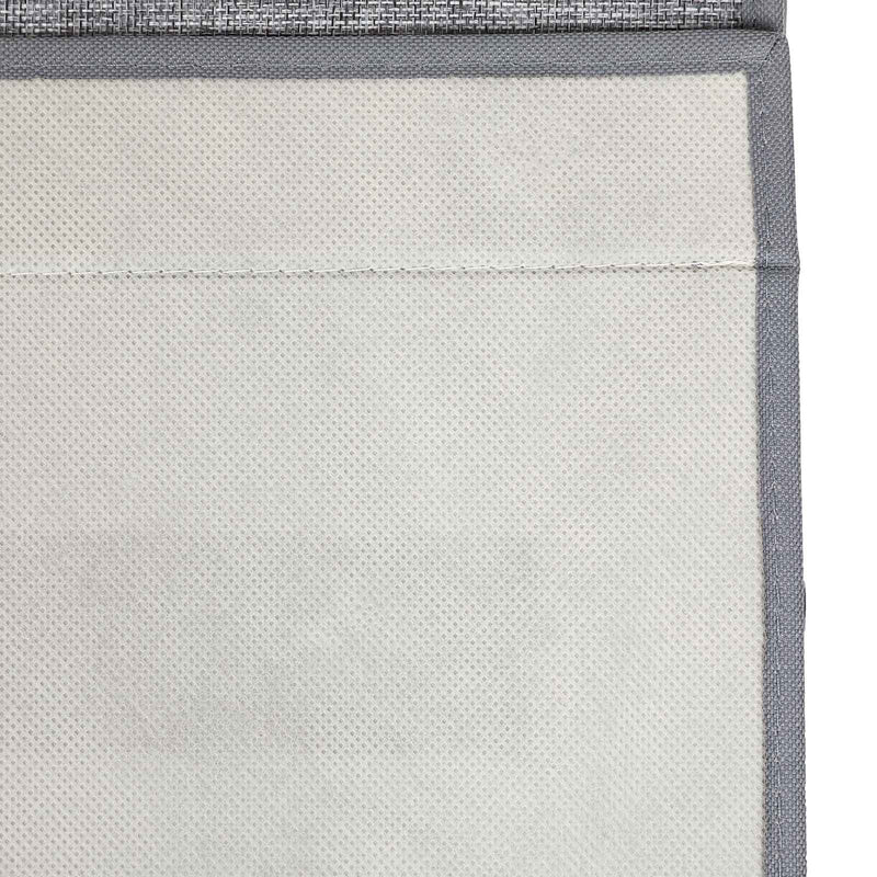 Close-up of the woven grey fabric outer and the pale inner lining