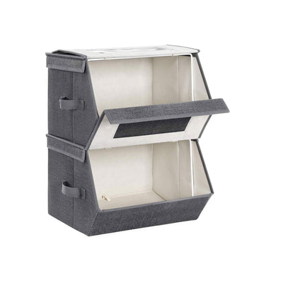 Stacked grey storage boxes with the top front flap dropped open showing the cream interior