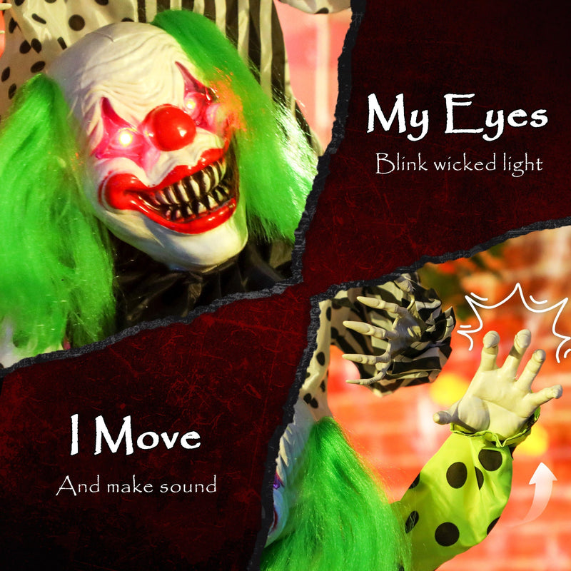 Close-up of the middle clown's light-up eyes and moving hand feature