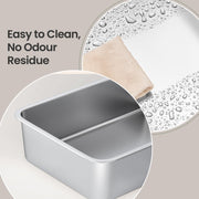 Close-up of the stainless steel tray interior with a cloth, showing the easy-to-clean surface