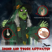 Standing green witch prop showing the press button, touch and loud sound activation options