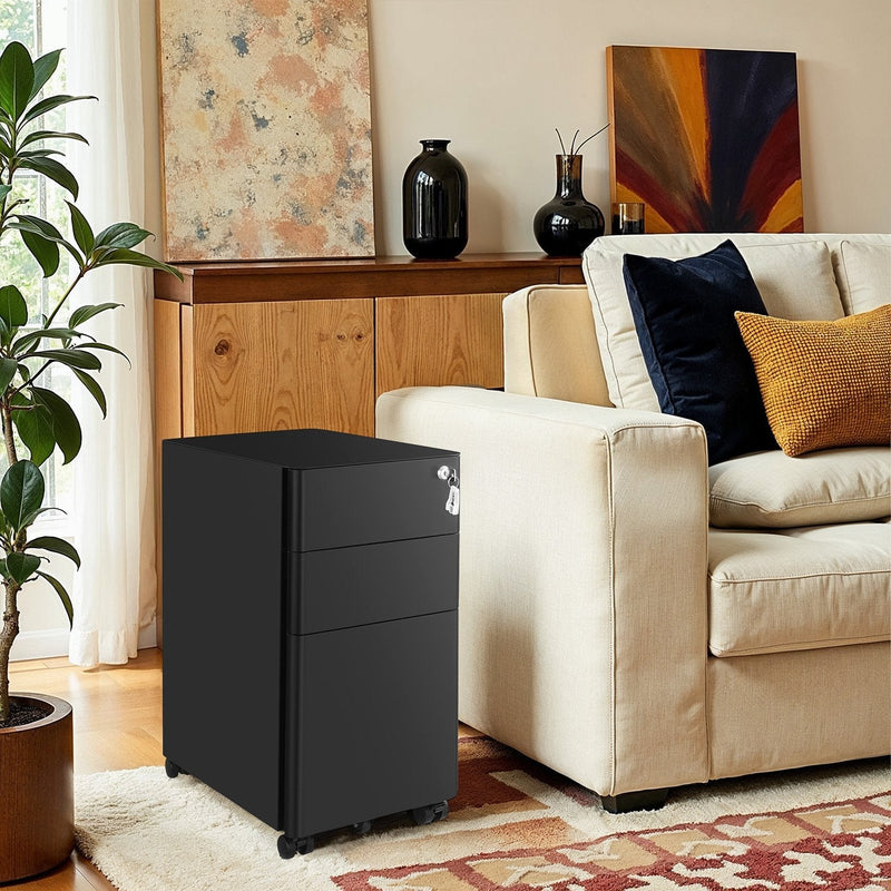 Black file cabinet standing in a living room beside a cream sofa and a wooden sideboard
