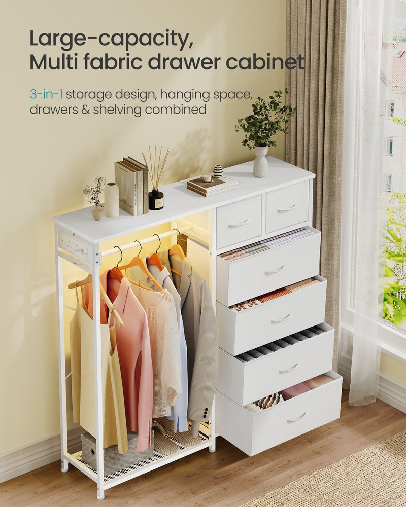 Steel open wardrobe styled in a bedroom with books and decor on the tabletop