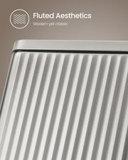 Close-up of the fluted steel texture on the pedal bin body
