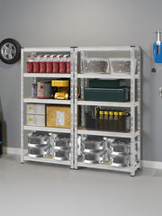 Two silver shelving units filled with garage supplies against a grey garage wall