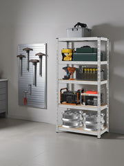 Silver shelving unit in a garage beside a tool board, loaded with equipment