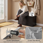Woman sitting on the black storage bench to tie her boots, beside a 15 mm board thickness comparison